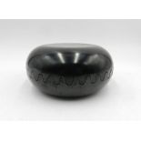 A pair of black Mebel interlocking clam ashtrays designed by Alan Fletcher, with marks to interior -