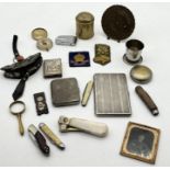 A collection of assorted items including brass calendar, eastern brass pot, SCM and leather purse,