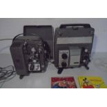 A Bell Scope R-50 movie projector plus one other, with three films, Charlie Chaplin - Charlie on