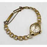 A 9ct gold ladies Rotary watch on 9ct strap, total weight 11.8g