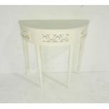 A white painted demi lune table with pierced decoration - length 80cm