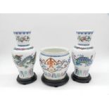 Two Chinese porcelain vases along with a bowl - "The Dance of the Celestial Dragon", "The Courage of
