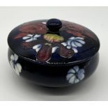 A Moorcroft "Frilled Orchid" powder bowl, original sticker base - height 10cm