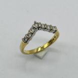 An 18ct gold diamond 7 stone wedding band/ring