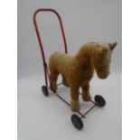 A vintage child's pull-along horse by International Model Aircraft Ltd