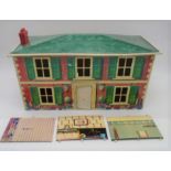 A vintage Mettoy Playthings tinplate dolls house