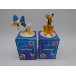 Two boxed Royal Doulton The Mickey Mouse Collection ceramic figurines including Donald Duck & Pluto