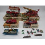 A collection of four built Airfix 32 Scale construction model kits including Dennis Fire Engine,