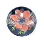 A small Moorcroft 'Clematis' pattern pin dish with stamped mark to back and arrow date cypher-