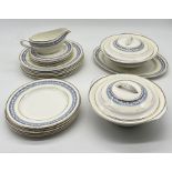 A Portland Pottery part dinner set including terrines, gravy boat, dinner plates etc.