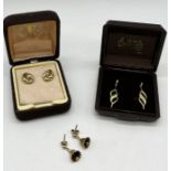 Three pairs of 9ct gold earrings, total weight 3g