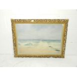 A framed watercolour of a beach scene signed 'S. Towers' - the ornate gilt frame with some losses