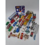A collection of loose play worn die-cast vehicles including Dinky Toys, Corgi Toys, Matchbox,