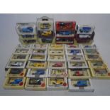 A collection of boxed die-cast vehicles including Matchbox Models of Yesteryear and Lledo Days