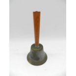 An antique brass hand bell