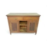 An Edwardian sideboard with central open cupboard - length 121cm, height 89cm.