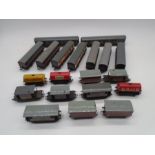 A collection of model railway OO gauge rolling stock and carriages including Hornby oil tankers,