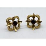 A pair of 9ct gold and garnet earrings with screw fitting, total weight 5.2g