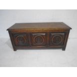 A Breton oak coffer with traditional decoration