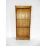 A pine freestanding bookcase - length 91cm, height 200cm, depth 29cm