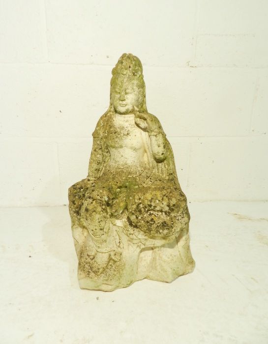 A weathered reconstituted stone garden figure of the Quan Yin Buddha - height 50cm