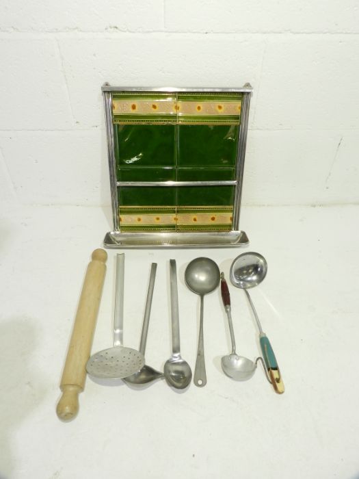 A vintage tile backed aluminium wall hanging kitchen utensil stand with utensils - Image 2 of 2