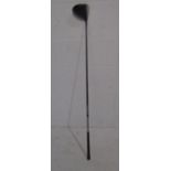 A Taylor Made Fujikura left handed Speeder 65 driver golf club with adjustable angle key