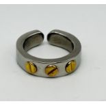 An 18ct white and yellow gold ring, weight 6.9g