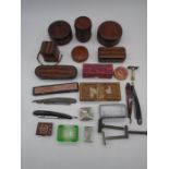 A collection of vintage shaving items including WW1 period straw-work containers, razors, brush etc