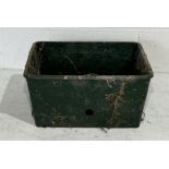 A small cast iron trough with makers name E & H Roberts