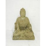 A weathered reconstituted stone statue of a seated Buddha - length 52cm, height 73cm