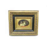 A modern print of a cat and dogs in a heavy gilt frame - 29cm x 34cm