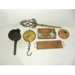 A copper carriage foot warmer along with a Salter scale, carriage lamp etc.