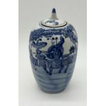 A 19th century Chinese blue and white lidded jar with double ring mark to base