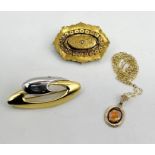 A 9ct gold two colour brooch along with a 9ct pendant and chain (total weight 2g) and a Victorian