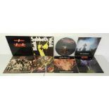 A collection of eight rock 12" vinyl records comprising of Black Sabbath - 'We Sold Our Soul For