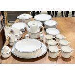 A Royal Doulton "Juno" part dinner service including teapot, serving dish, cups, saucers, bowls etc.