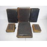 A collection of six Victorian leather photograph albums, some with a selection of photographs