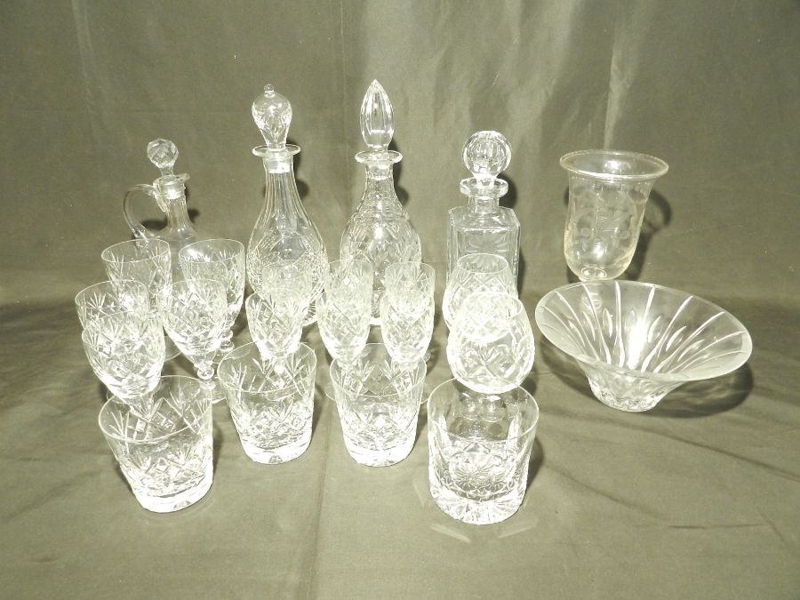 A collection of cut glassware including a Victorian celery glass, decanters etc - some with