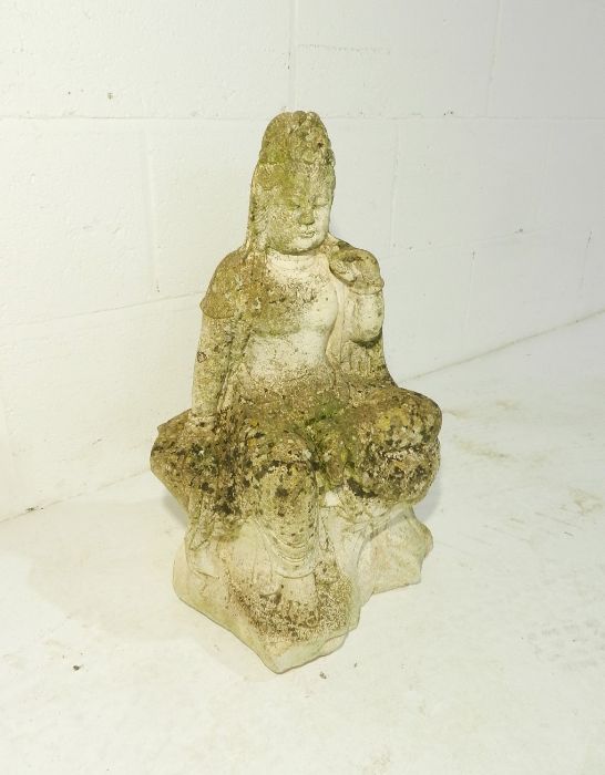 A weathered reconstituted stone garden figure of the Quan Yin Buddha - height 50cm - Image 2 of 4