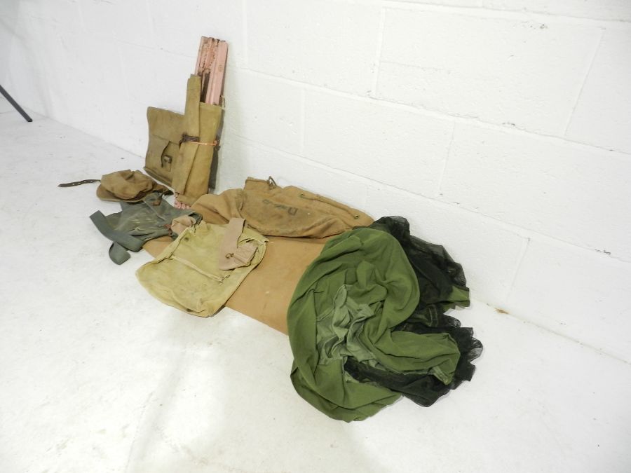 A collection of WW2 era military canvas bags, bed, hat etc. Some with broad arrow mark. - Image 4 of 5