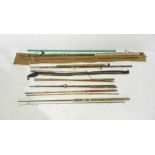 A quantity of fly fishing rods including an Apollo 8ft fly rod, a Winfield dry fly 8ft rod, some