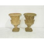 A pair of reconstituted stone classical style garden urns - height 58cm, diameter 39cm