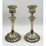 A pair of hallmarked silver candlesticks, height 18.25cm