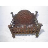 A cast iron fire basket