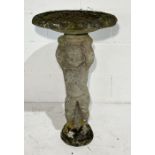 A sectional composite stone birdbath in the form of a cherub - height 73cm