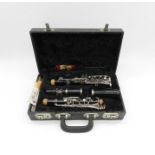 A Romilly Sonata clarinet with reeds and hard case