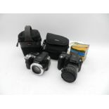 A Fuji FinePix S5600 digital camera along with a FinePix S8000fd digital camera with cases etc.