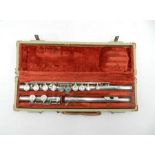An Artley Elkhart-Ind three piece flute, with original hard case.