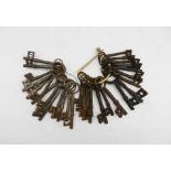 A quantity of antique keys